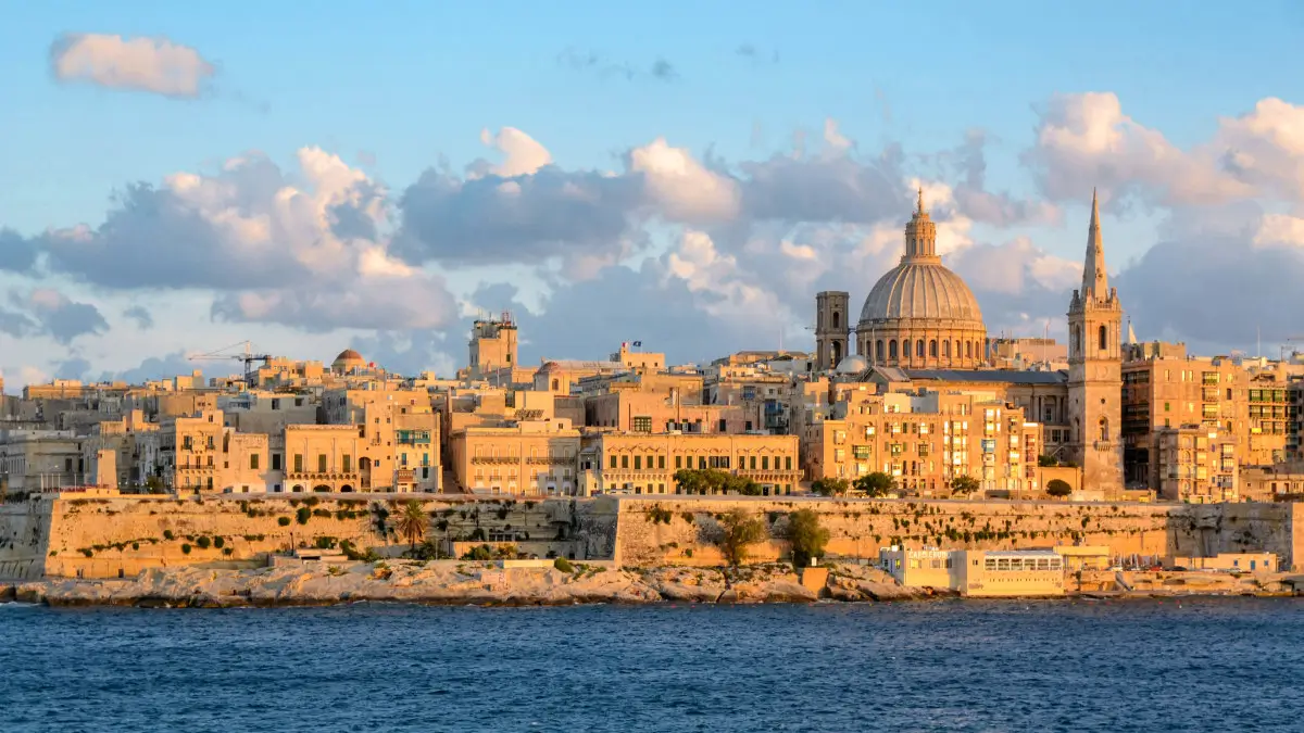 Valletta skyline over Grand Harbour at sunset